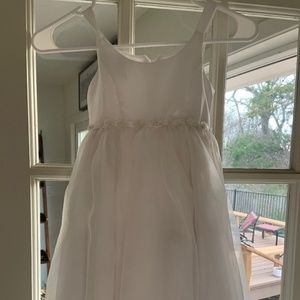 White flower girl dress with pearl rose edging